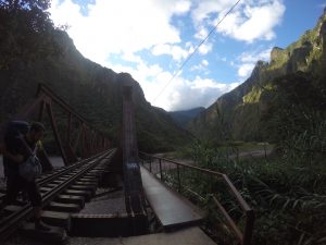 Go on foot along the train tracks to Machu Picchu