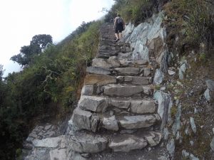 Climb stairs Montana Picchu Peru